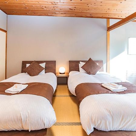 Nomad Hakuba Acomodação com café da manhã Exterior foto