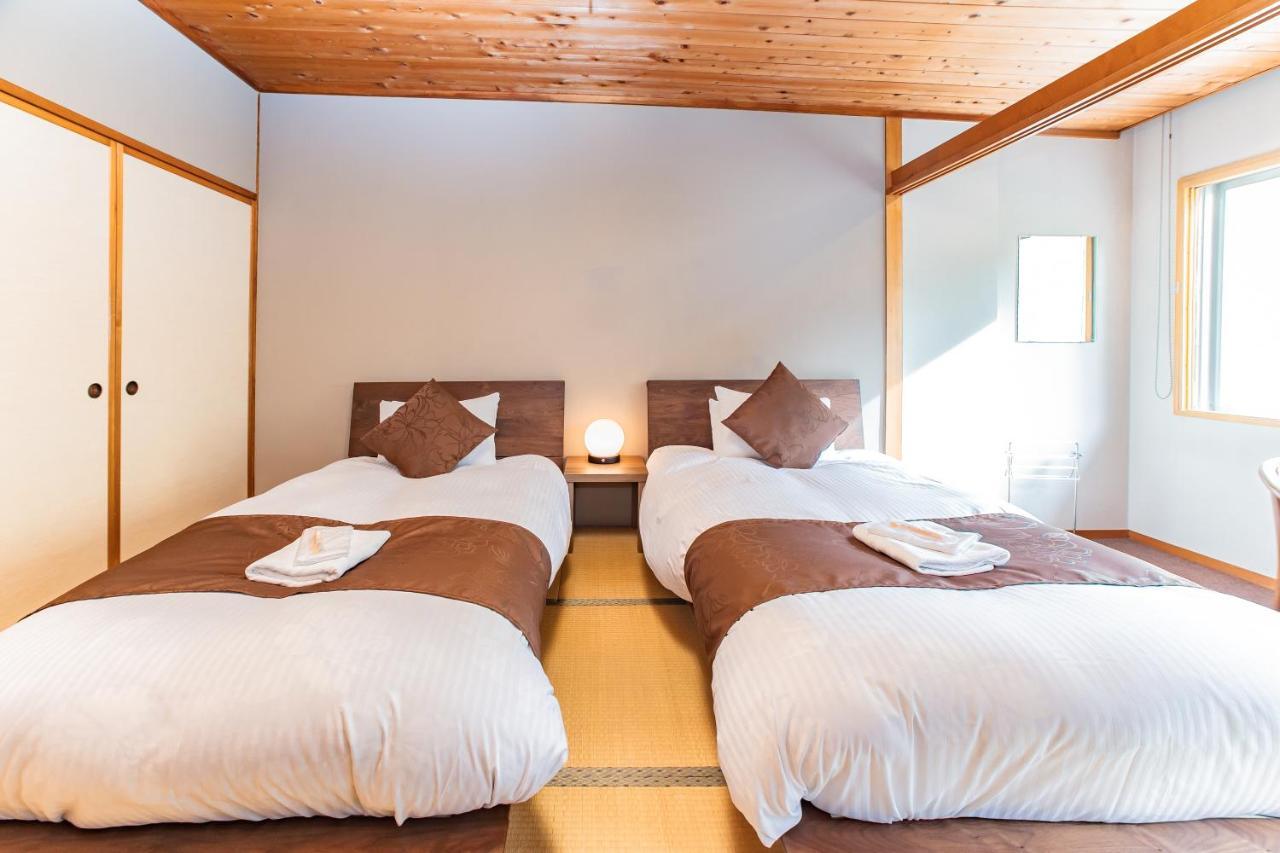 Nomad Hakuba Acomodação com café da manhã Exterior foto